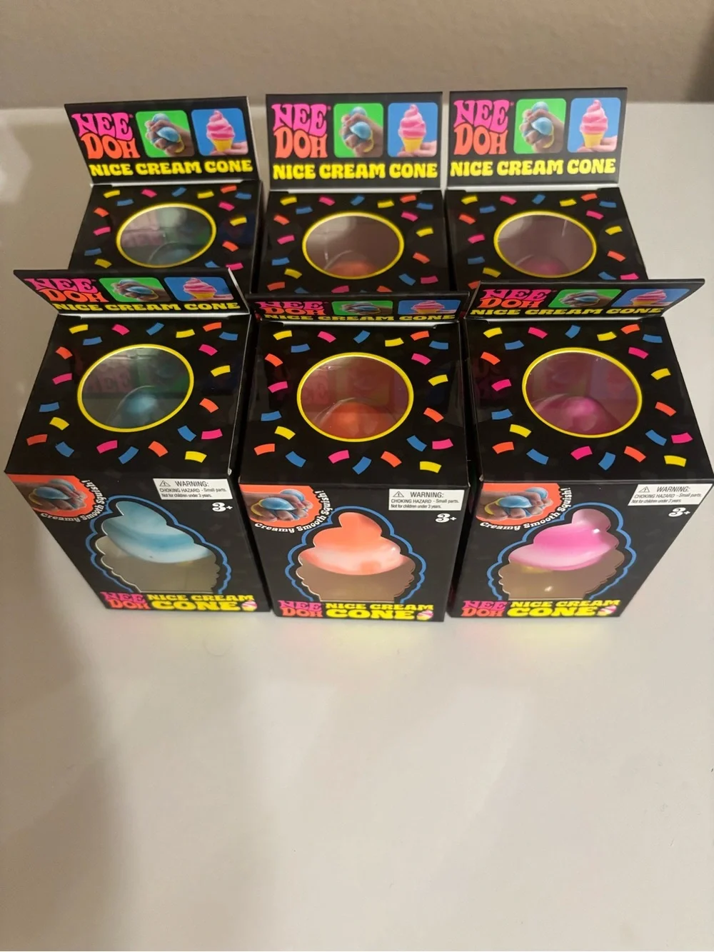 (3) NeeDoh Nice Cream Cones Squishy Toy - Blue, Orange, Pink (Set)
